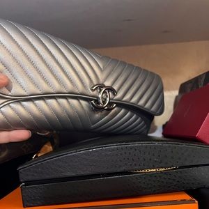 Multiple Chanel and Louis purses